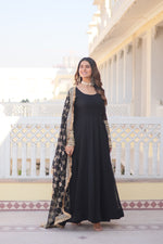 Load image into Gallery viewer, Black Faux Blooming Anarkali Embroidery Work with Round Neck Embroidered Gown with Designer Lace Sequins Embroidered work with designer lace border With Price and Online Best Shopping Price Under 2000 . Faux blooming gown with Sequins Embroidered Multi-Sequins work, full sleeves, and a 2.30 meter dupatta. Available in rich Black . Perfect for festive occasions . Traditional Look For Anarkali 2025-26 .