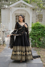 Load image into Gallery viewer, Black Faux Blooming Gown With Price and Online Shopping Price Under 2000 . Elevate your style with this stunning Faux Blooming Sequins Gown. Complete with a 3.5-meter flair, cotton lining, and designer dupatta, it’s perfect for festive and formal occasions .