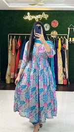 Load image into Gallery viewer, Elegant blue cotton muslin Anarkali with digital print , Blue puff sleeve Anarkali with shine and embroidery work , Designer blue Anarkali suit for festive occasions , Soft cotton blue Anarkali with stylish V-neck , Ethnic blue Anarkali with top, bottom & dupatta set .