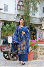 Load image into Gallery viewer, Blue Color Roman Silk Kurti Floral Print With Beets Handwork , Pent Plain and Dupatta Digital Print Price and Online Shopping Price Under 2000 , This Fabric Blue Color Roman Silk Kurti For Weddings Wear Collection Best Price 2000 , Stylish Suit Set With Hand Beets 
 Roman Silk Dupatta. Includes a kurti and matching pants in heavy mill Roman Silk print fabric. Featuring a heavy suit set in Roman Silk With Beets Handwork .