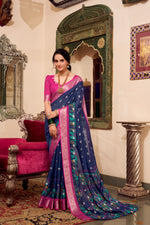 Load image into Gallery viewer, Navy blue silk saree with zari work , 
Royal blue saree with blouse piece , 
Soft blue cotton saree for daily wear , Blue saree with silver lace border , Indigo blue printed saree online , Fancy blue georgette saree with sequins , Blue bridal saree for reception , Light sky blue saree for haldi , Designer blue saree with embroidery , Party wear blue saree under ₹2000 .