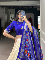 Load image into Gallery viewer, Blue Tussar Silk Dhavani Set | Langa Voni | Half-Saree With Price and Online Shopping Price Under 2000 . Floral charm meets luxury with this Tussar Silk Lehenga Set. Stitched lehenga with can-can, micro cotton lining, unstitched blouse, and a tassel-adorned dupatta make it the perfect festive wear .