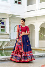 Load image into Gallery viewer, Blue Tussar Silk Dhavani Set, Langa Voni , Davani and Half-Sarees With Price and Online Best Shopping Price Under 2000 . This fabric So Heavy Premium and rich Fabric and Rich Border Patola Printed this Fabric and Blouse foil Printed and Dupatta Patola Print with Gotta Patti Lace Border also comes with tassels . Traditional look 2024-25 .