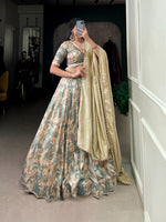 Load image into Gallery viewer, Step into elegance with our premium Stitched Tussar Silk Lehenga Set, crafted for style and comfort. Featuring intricate printed designs with lace touch-up, this lehenga is a must-have for weddings, festive occasions, and special events. Paired with a matching stitched blouse and a beautiful Vichitra Silk dupatta with sequins embroidery, this set blends tradition with modern charm.