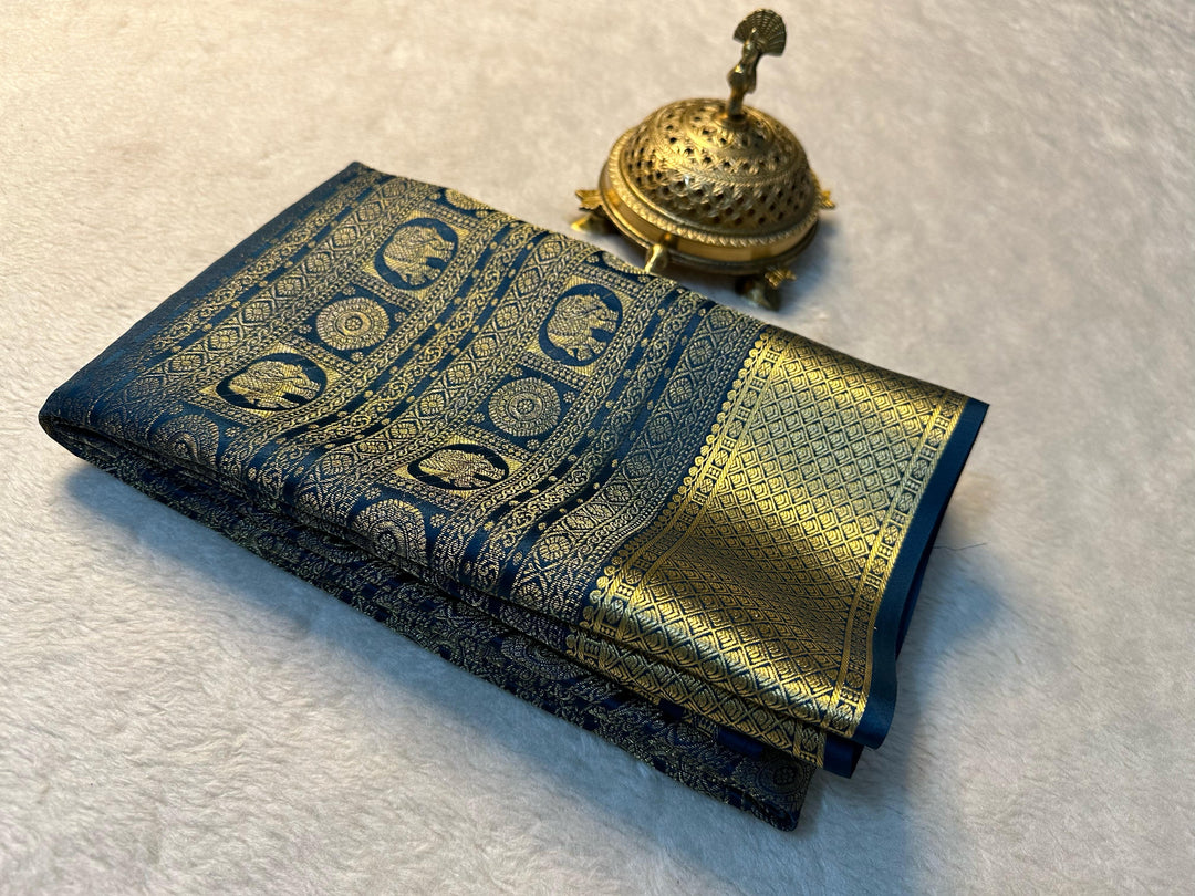 Elegant blue Mysore saree for wedding , Blue silk saree for festive occasions , Navy blue zari weaving saree , Blue ethnic saree for women  , Mysore silk saree in deep blue , Wedding wear blue silk saree , Classic blue zari saree look , Blue Mysore silk party wear saree .