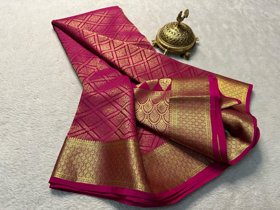 Dark Pink Color Zari Weaving Work Mysore Silk Sarees With Price and Online Shopping Price Under 1500 . Explore the timeless beauty of Kanchipuram (Kanjivaram) silk sarees, renowned for their intricate zari work, vibrant colors, and luxurious craftsmanship. Perfect for weddings and festive occasions . Traditional Look 2024-25 .