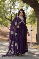 Load image into Gallery viewer, Dark Rani Faux Blooming Anarkali Embroidery Work with V-Neck Embroidered Gown with Designer Lace Dupatta With Price and Online Best Shopping Price Under 1500 . Faux blooming gown with zari sequins embroidery, full sleeves, and a 2.3-meter dupatta. Available in rich maroon and purple hues. Perfect for festive occasions .