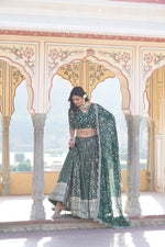 Load image into Gallery viewer, Dark Sky lehenga set with faux blooming blouse fabric , Modern festive look in Dark Sky lehenga with sequin detailing , Stunning Dark Sky lehenga with tassels and zip closure , Sophisticated Dark Sky lehenga for parties and receptions , Designer Dark Sky color lehenga with 3.5 Meter flair .