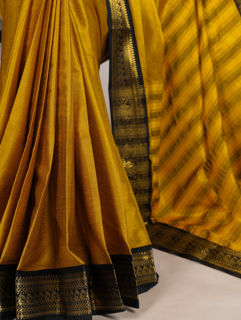 Yellow zari weaving saree for haldi and functions , Bright yellow aura silk saree with classic border , Festive wear yellow silk saree with zari detailing , Yellow saree with matching blouse piece included , 
Aura silk yellow saree for radiant ethnic charm .