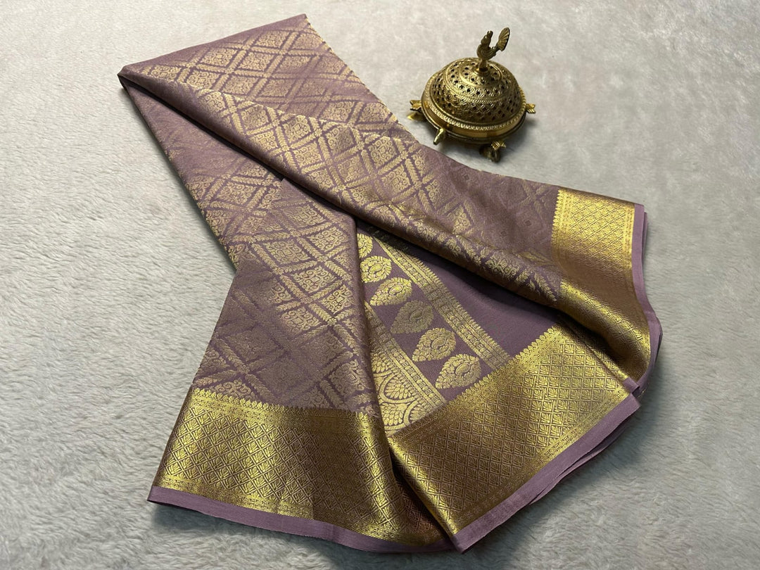 Gajari Color Mysore Silk Sarees With Price and Best Wedding Online Shopping Price Under 1500 . Explore the timeless beauty of Kanchipuram (Kanjivaram) silk sarees, renowned for their intricate zari work, vibrant colors, and luxurious craftsmanship. Perfect for weddings and festive occasions . Traditional Look 2024-25 , 2025-26 .
