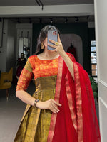 Load image into Gallery viewer, This stitched Mansi Kanjivaram Anarkali gown features elegant zari weaving on rich Kanjivaram fabric. It has a 40" chest with extra margin for comfort, a 38" waist, and a 56" length with 3.5 meters of flair. The gown includes full silk lining and 13" sleeves. The accompanying net dupatta is plain with a lace border, measuring 2.4 meters long.