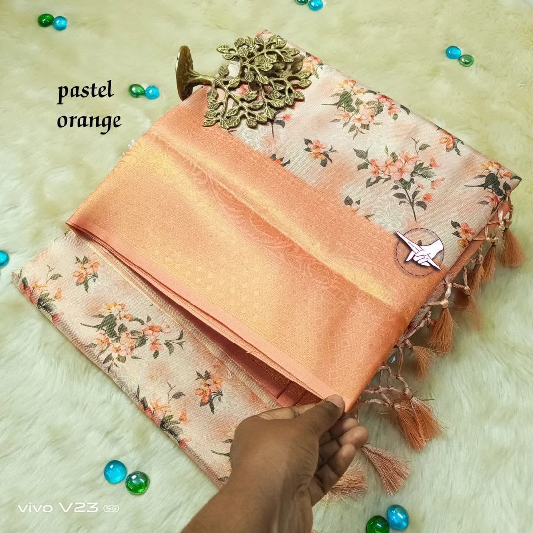 Light Orange Soft Silk the most popular and highest quality silk in India , The states of Tamil Nadu, Karnataka, Andhra Pradesh, West Bengal, and Jammu and Kashmir are the main producers of Soft Saree in under  1500 . This Saree Orange Soft Silk Saree Best Wedding Wear Collection in 2025-26 .