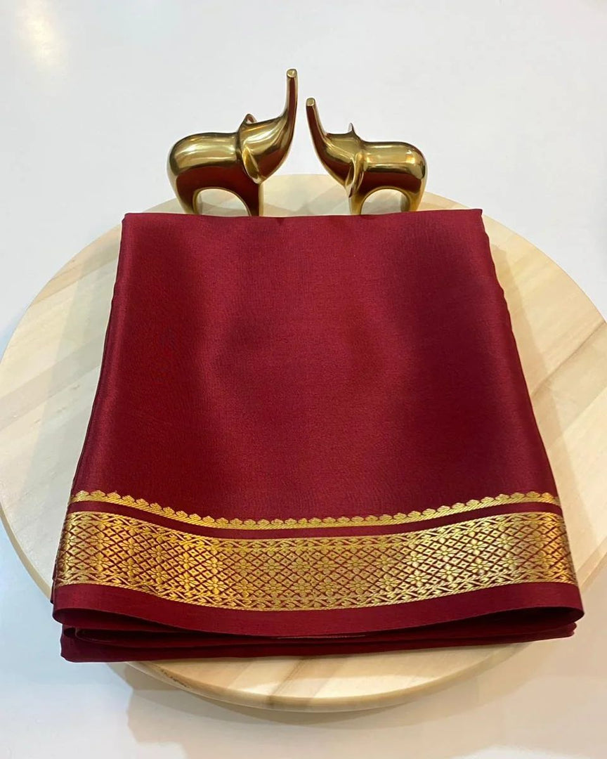 Pure Semi Mysore Silk Coffee Color Saree From Best Saree Manufacturer of Karnataka, India. Mysore Silk Saree Is Tradition Of All Over India But Mostly In South India State Like Andhra Pradesh , Tamilnadu ,Telangana ,kerala , Golden zari weaving  Silk , Saree Under 1000 RS .