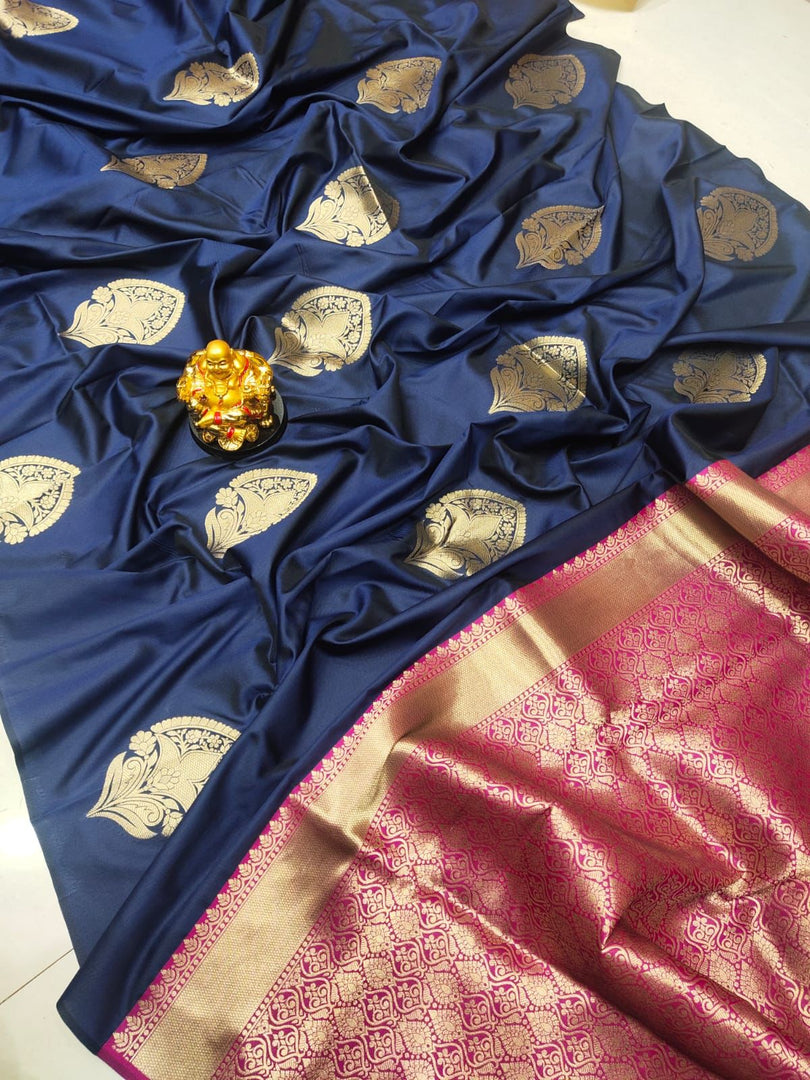 Dan Blue Or Navy Lichi Silk Sarees With Price and Online Shopping Price Under 1500 . Fully Zari Weaving Work , This Saree Weddings Wear Collection In Saree . This Woman Model Wear Collection Traditional Look 2025 .