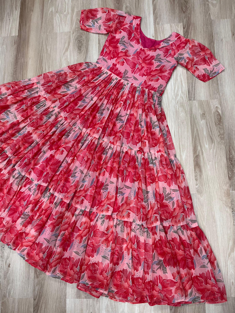 Peach printed gown stitched with full inner lining , Fancy peach ethnic gown for daytime functions , Peach gown with vibrant print and elegant style Price Under 1499 .