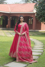 Load image into Gallery viewer, Pink Color Faux Blooming Gowns With Price and Best Choise Special Weddings Wear Collection and Online Shopping Price Under 1500 .  Shop this stunning pink gown with a dupatta, featuring Faux Blooming fabric, multi-sequins embroidery, 3.5-meter flair, and a fancy round neck. Includes Russian silk embroidered dupatta  .