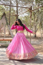 Load image into Gallery viewer, Alterable stitched pink blouse (fits 38 to 44 inches) , Stunning pink lehenga for wedding and festive occasions , Kalamkari bordered pink lehenga with a modern twist , Pink lehenga set with full-stitched ready-to-wear finish , Luxurious pink lehenga for bridesmaids and wedding guests .
