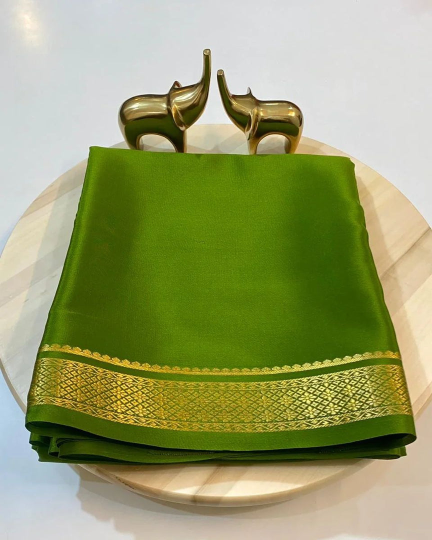 Pure Green semi mysore silk sarees with price and online shopping price under 1000 . this fabric smooth and softness fabric this fabric most popular and green color  most unique crafted this price under 1000 .