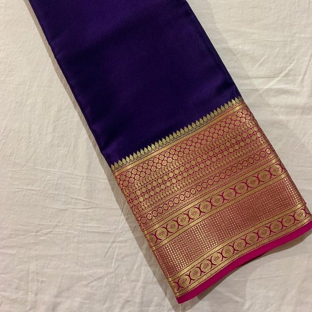 Navy Blue Semi-Mysore Silk Saree price online shopping under 1000 . 
This Color Semi-Mysore Silk Saree With Gold Zari Weaving Work and rani Pattu For Weddings and So look Mainly ,Manufacturing in Mysore District in Karnataka, India.