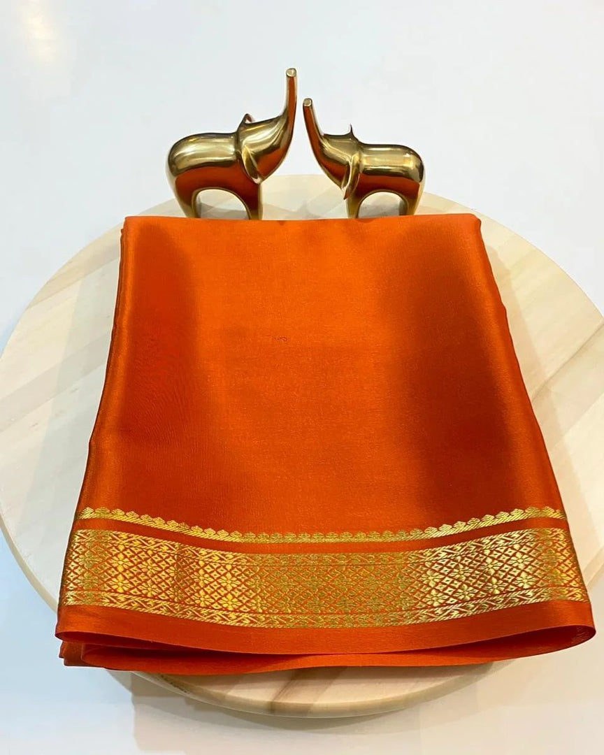 Pure Orange semi mysore silk sarees with price and Gold zari weaving gold this fabric best famous and best popular product . this Saree semi mysore silk saree price under 1000 .