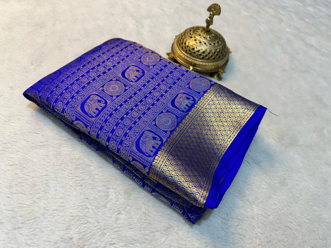 Royal blue Mysore silk saree , Blue zari work silk saree , Traditional blue saree with blouse , Elegant blue Mysore saree for wedding , 
Blue silk saree for festive occasions , Navy blue zari weaving saree , Blue ethnic saree for women , Mysore silk saree in deep blue , Wedding wear blue silk saree , Classic blue zari saree look .