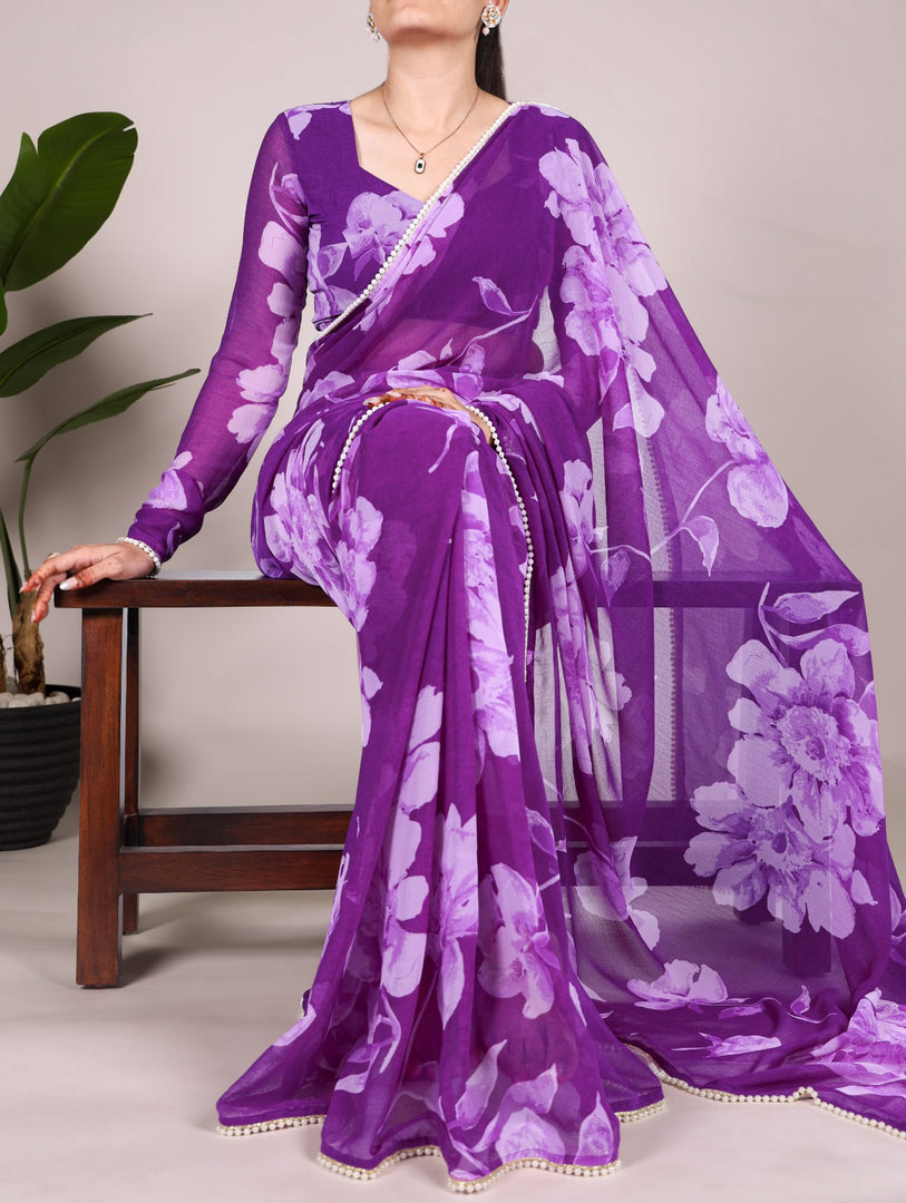 Purple Color Chiffon Saree , Floral Print Pearl Lace Border Saree Price and Online Shopping Price Under 1500 ,  this Fabric Purple Chiffon Saree Original . This Saree Traditional Look For 2024-25 , 2025-26 .