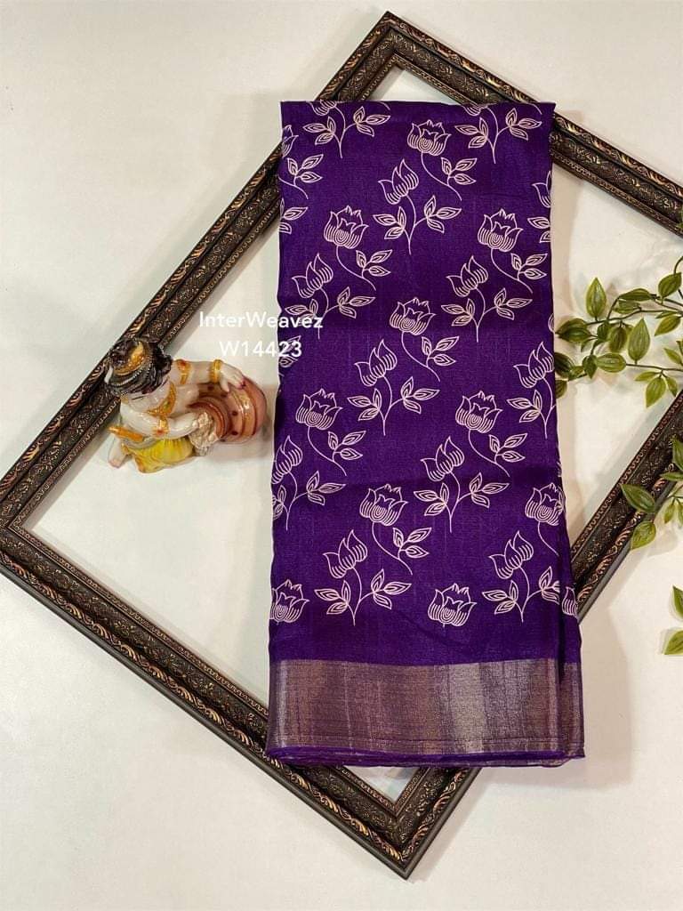 Purple Color Heavy Dolla Cotton Silk Sarees Price and Online Shopping Price Under 1500 . Embrace royalty with our Purple Super Dolla Cotton Silk Saree featuring digital floral and peacock prints . This Purple saree blends tradition and trend with stunning Leriya patterns and a Vickosh Jacquard border.
