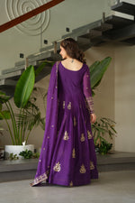Load image into Gallery viewer, Purple gown with zari sequins and beads neckline , Gown with dupatta set in rich purple chinnon silk , Trending purple ethnic gown for graceful evening looks .