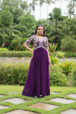Load image into Gallery viewer, Purple Faux Blooming Gown With Price and For Weddings Price Under 1500 . this Fabric So Happy and Cool Fabric . this Fabric Faux Blooming Gown Online Best Shopping Price Under 1500 . this Fabric Best Famous and Best Popular Gown Purple Color. Purple Gown Round Neck Fully Embroidery Zari Sequins Work .