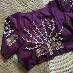 Load image into Gallery viewer, Purple Haka Silk Stitched Blouse With Price and Online Shopping Price Under 1500. this Stitched Blouse Sleeve 10 Inches and Best For Weddings Wear Collection . this Fabric Haka Silk Fabric Pure and Silky Fabric Purple  Color Embroidery work and Elephant Designs .