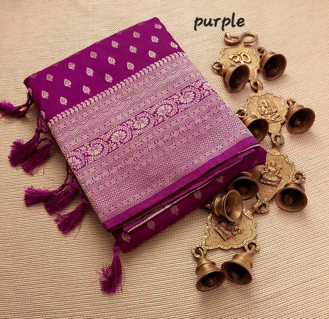 Pure Purple soft silk sarees with price and online shopping price under 1500 . This Fabric Soft Silk Saree With Silver Zari Weaving Saree . This pure soft silk saree price under 1500.