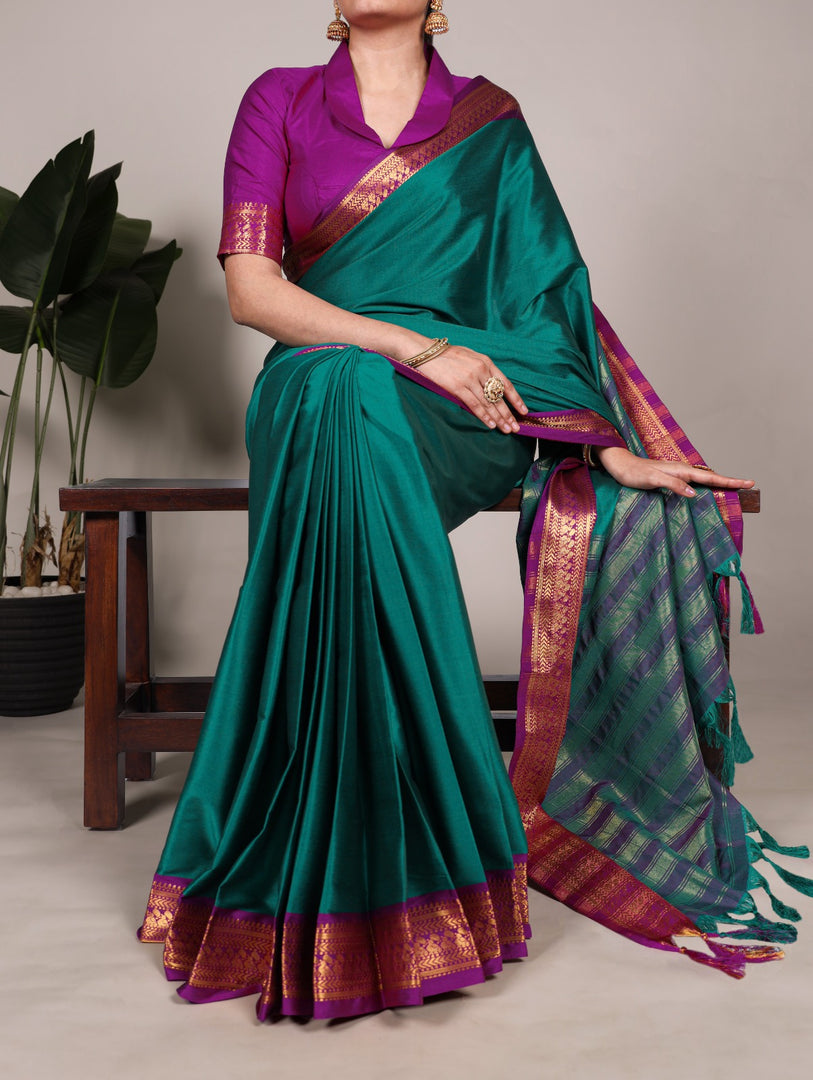 Trendy rama green silk saree with zari weaving , Rama color aura silk saree with ethnic touch , Zari woven rama saree for weddings and events , Elegant rama silk saree for festive look , Aura silk rama saree with beautiful blouse fabric .