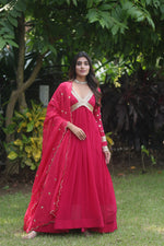 Load image into Gallery viewer, Rani Faux Blooming Anarkali , Embroidery Zari Sequins-work
With price and Online Shopping Price Under 1500 . Luxurious faux blooming gown with zari sequins embroidery, a fancy V-neck, and full sleeves. Comes with a 2.3-meter sequins lace dupatta. Ideal for any occasion. Traditional Look For 2024-25 , 2025-26 .