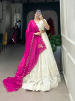 Load image into Gallery viewer, White georgette lehenga with Lucknowi paper mirror detailing , Bridal white stitched lehenga with cancan and canvas , Elegant white lehenga for mehendi, haldi, and receptions , Mirror work white lehenga with sequins embroidered dupatta , Soft white color lehenga with thread and mirror highlights , Designer white Lucknowi lehenga set with classic blouse.