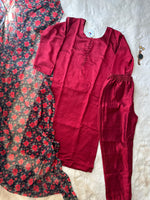 Load image into Gallery viewer, elegant Red kurti set features heavy blooming Romain silk fabric with a plain design, complemented by a printed Kota chex dupatta and matching pants. It has a round neck, full sleeves, and a 46-inch length. The set is machine washable and includes one kurti, one pant, and one dupatta.