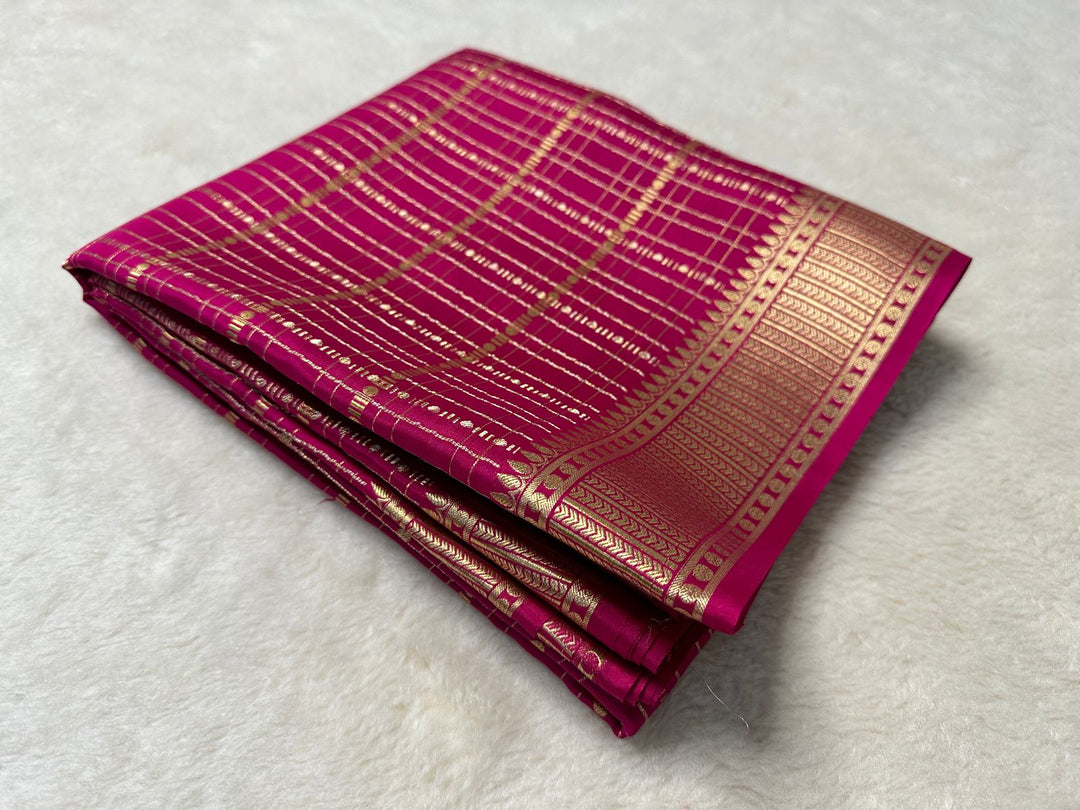 Premium Mysore Silk Saree featuring Zari Weaving. 6.3m length with matching blouse piece. Machine washable. Model wears Zari weaving saree price 1399.