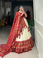 Load image into Gallery viewer, Red Tussar Silk Dhavani Set , Half-Saree , Davani Set and Langa Voni With Price and Online Shopping Price Under 2000 . This Fabric Patola Printed Work and This Fabric Soft and Smooth Fabric . This Fabric Red and Cream Combination Color FIne and Dupatta Jumka Latkan Cream Lehenga Red Blouse Traditional Look For 2024-25 .