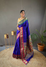 Load image into Gallery viewer, Royal Blue Paithani Sarees Paithani Weaving Work and This Fabric Price and Online Shopping Price Under 2000 . this Fabric Blue Paithani Saree Rich Border and Premium Fabric and Pink  Border Gold Zari Weaving Work and Rich Work Paithani Weaving Work Fully Saree , Traditional Look For 2024-25 , 2025-26 .