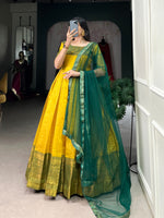 Load image into Gallery viewer, Bright yellow Kanjivaram gown with zari weaving , Yellow traditional silk gown with dupatta , Sunshine yellow ethnic gown with lace border dupatta , Yellow zari gown for festive and sangeet wear , Elegant yellow gown with full flair and lining.