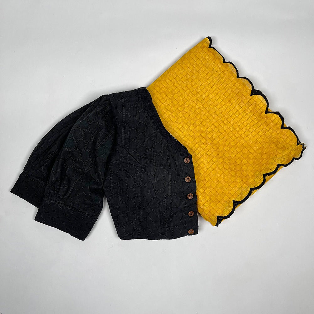 Yellow Color With Black Blouse Gadhwal Chex Saree With Price and Online Shopping Price Under 1500 .  Enhance your ethnic charm with this Gadhwal Chex Saree featuring Arca work. Paired with a stitched Lucknowi work cotton blouse with adjustable sizing, it’s a perfect blend of style and comfort .