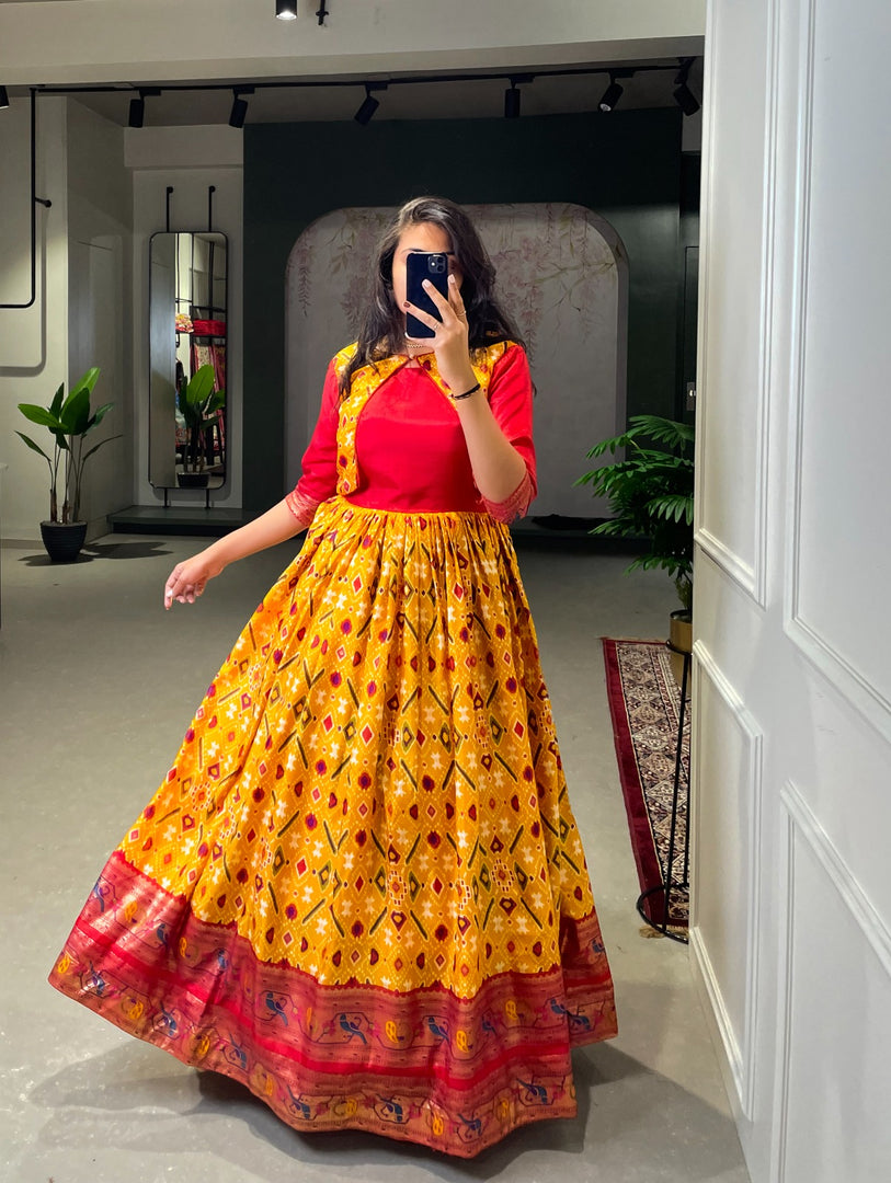 Yellow Dola Silk Gown With Price and Best Online Shopping Price Under 1500 . this Fabric Yellow Dola Silk Patola Paithani Print With Foil work in Gown and So Premium Fabric and RIch Design . This Design Fabric Dola Silk  Micro Cotton Lining. this Model Using crafted RIch Border Zari Weaving Work and Suit Koti Design This Peacock Design Traditional Look 2024-25 .