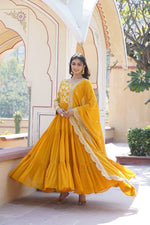 Load image into Gallery viewer, Yellow Faux Blooming & Viscose Dyable Jacquard Anarkali With Price and Online Shopping Price Under 2000 . Elegant 56-inch gown in faux blooming and viscose dyable jacquard fabric, featuring 12-meter flair and sequins embroidery. Paired with a cut-work sequins dupatta in Yellow Color vibrant colors . Traditional look For 2024 , 2025-26 .