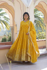 Load image into Gallery viewer, Yellow Color Faux Georgette Anarkali With Price and Online Shopping Price Under 2500 .This Fabric Yellow Color Faux Georgette Anarkali For Best Weddings Wear Collection Price , this Fabric Yellow Color Faux Georgette Fabric Top Side Fancy V Neck , Lengths 56 inch , Cotton Lining and Dupatta Faux Georgette With Rich Sequins Multi Embroidered Lace Border . Traditional Look For 2024-25 , 2025-26 .