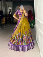 Load image into Gallery viewer, Purple With Dark Yellow Color Dola Silk Langa Voni , Davani Set , Half-Saree and Dhavani Sets With Price and Online Shopping Price Under 2000 . Make a statement with this Kalamkari Lehenga crafted in Dola Silk. Includes a flared lehenga, printed blouse, and a zari-bordered dupatta with tassels. Perfect for weddings and festive celebrations . Traditional Look 2024-25 .
