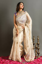 Load image into Gallery viewer, Cream Pure Soft Jimmy Choo Silk Sarees Price and Online Shopping Price Under 2000 . This Fabric Fully Heavy Embroidery Saree and Heavy Border Fully Machine with Purple Blouse Authentic Look 2024-25 . 
