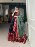 Load image into Gallery viewer, Black Color Tussar Silk Fabric Anarkali With Price and Online Shopping Price Under 1500 . This Fabric So Heavy Printed Work and Foil Working Print and Anarkali Bottom Side Heavy Border Zari Weaving Work , Dupatta Print and foil Print with Gotta Patti Lace Border also comes with tassels , This Fabric Black Anarkali Wedding Wear Best Collection , Traditional Look For 2024-25 , 2025-26 . 
