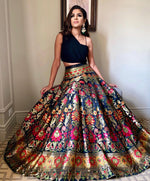 Load image into Gallery viewer, Black Color Banarasi Silk Dhavani Set | Davani Set , Langa Voni and Half-Saree Price and Online Shopping Price Under 2500 . Enhance your traditional wardrobe with this Banarasi Silk Lehenga Set. Adorned with Zari Weaving Work , it comes with a cotton-lined lehenga, blouse dupatta Plain .
