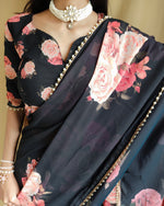 Load image into Gallery viewer, Elegant black georgette saree with zari weaving , Party wear black saree with blouse piece , Classic black zari saree for festive look , 
Black georgette saree with machine wash care , Black weaving saree for women under ₹1000 , Trendy black georgette saree with zari work .
