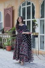Load image into Gallery viewer, Elegant Pure Cotton Anarkali set featuring a 52-inch top with half cotton lining, fancy round neck, and matching sleeves. Includes elastic-waist bottom and a 2  meter dupatta. All pieces crafted from premium pure cotton for comfort and style.
