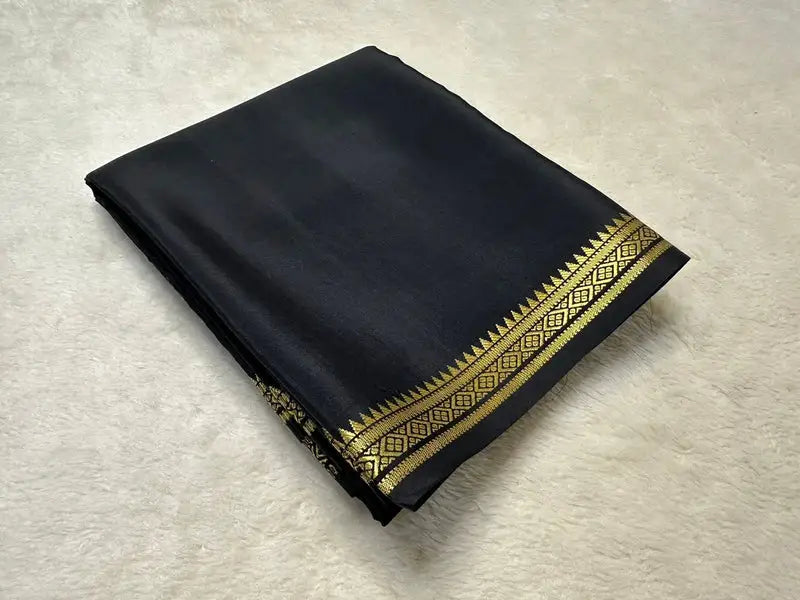 Elegant black silk saree with golden zari border , Designer black georgette saree with sequin work , Black Mysore silk saree with contrast blouse , Partywear black net saree with embroidered pallu , 
Traditional black saree with silver zari weaving , Black Banarasi saree for wedding and festive wear , Lightweight black cotton saree with printed design , Fancy black organza saree with scallop border , 
Pure black soft silk saree for classy occasions ..